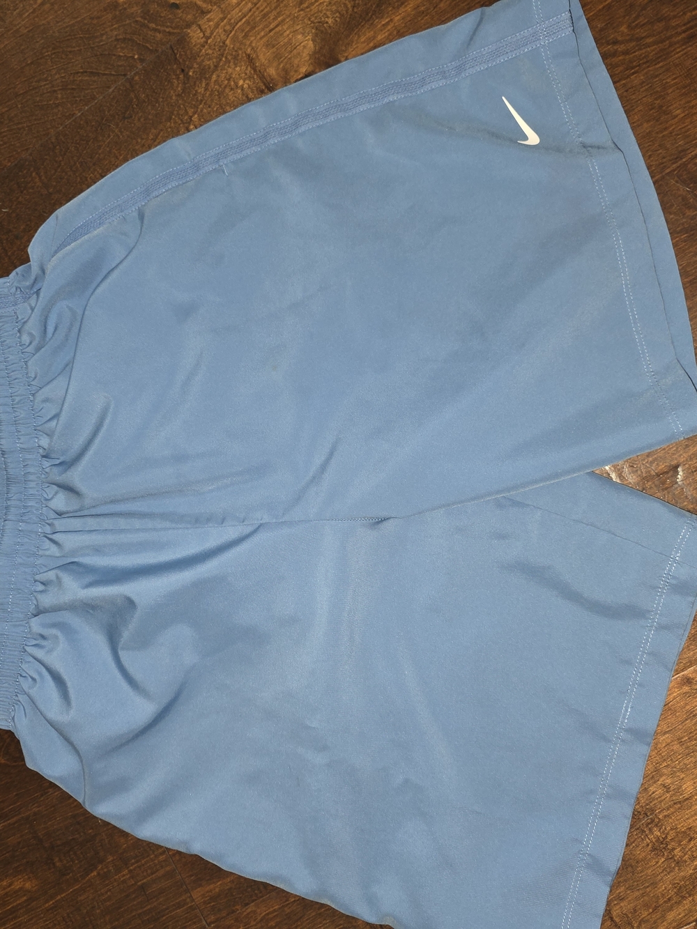 Nike Blue Athletic Shorts with White Swoosh